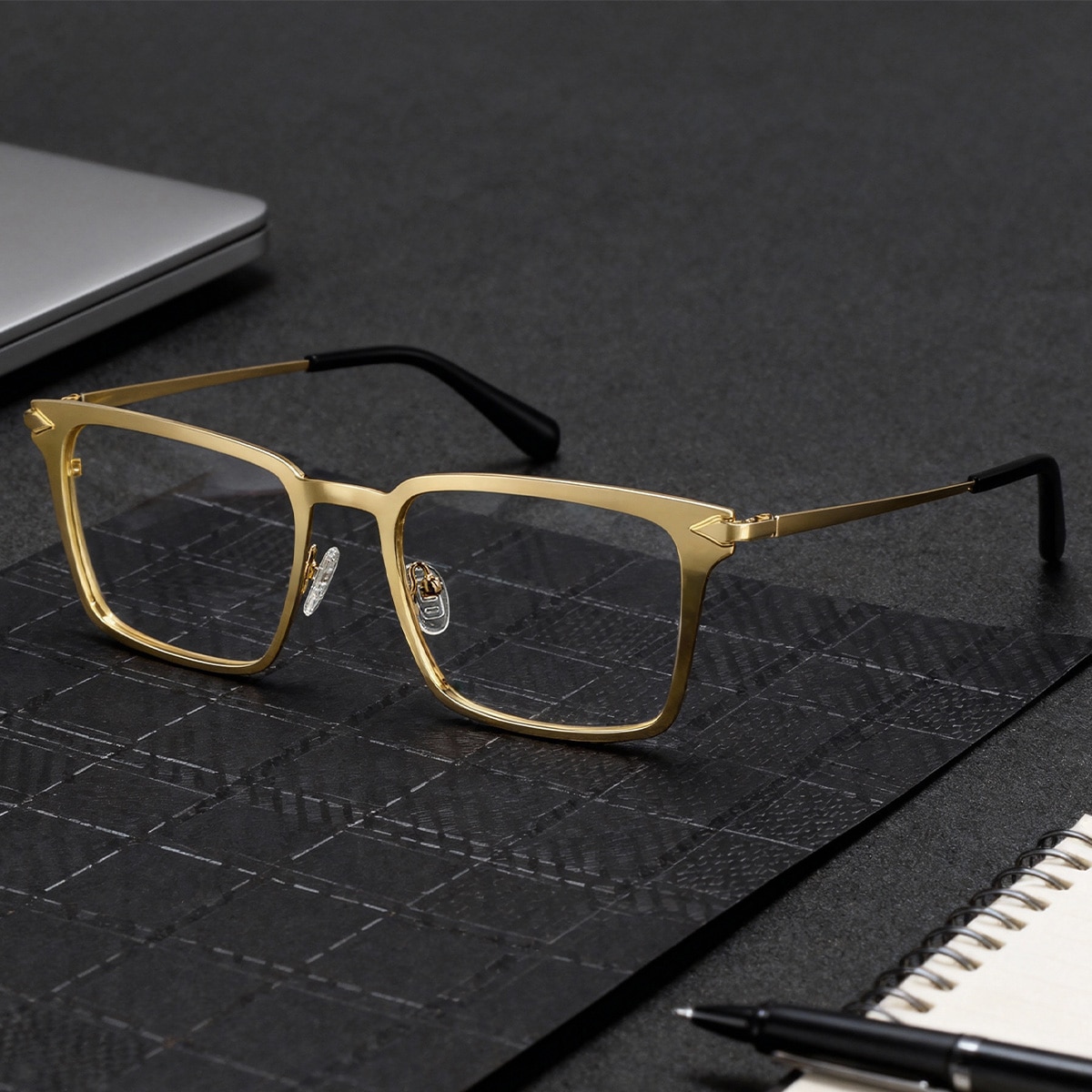 Gold Metal Frame Glasses With a Rectangle Shape