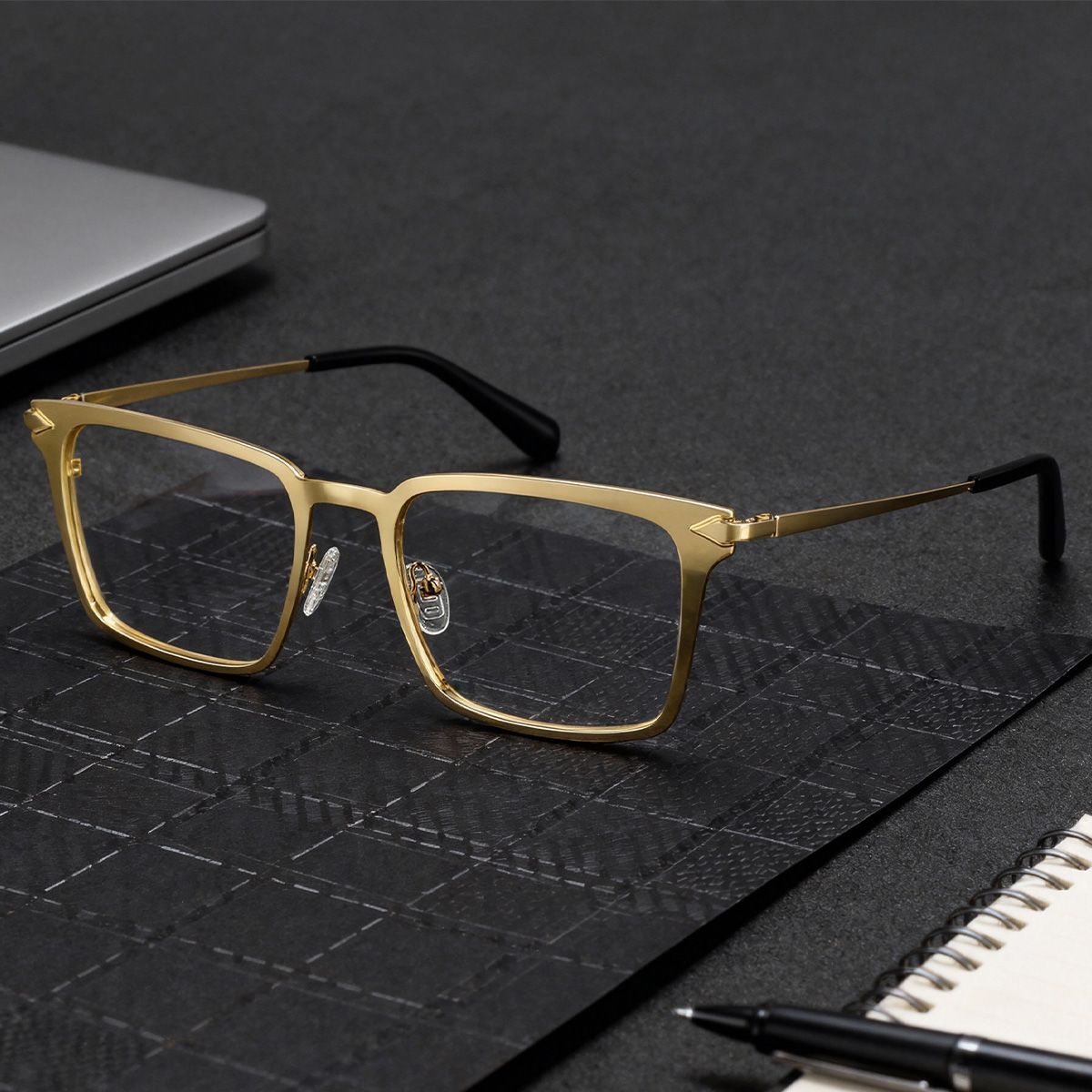 Gold Metal Frame Glasses With a Rectangle Shape0