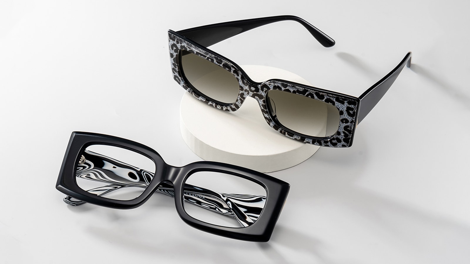 Two pairs of fashionable ZEELOOL glasses, including leopard-print sunglasses, showcasing stylish options that offer essential UV400 eye protection.